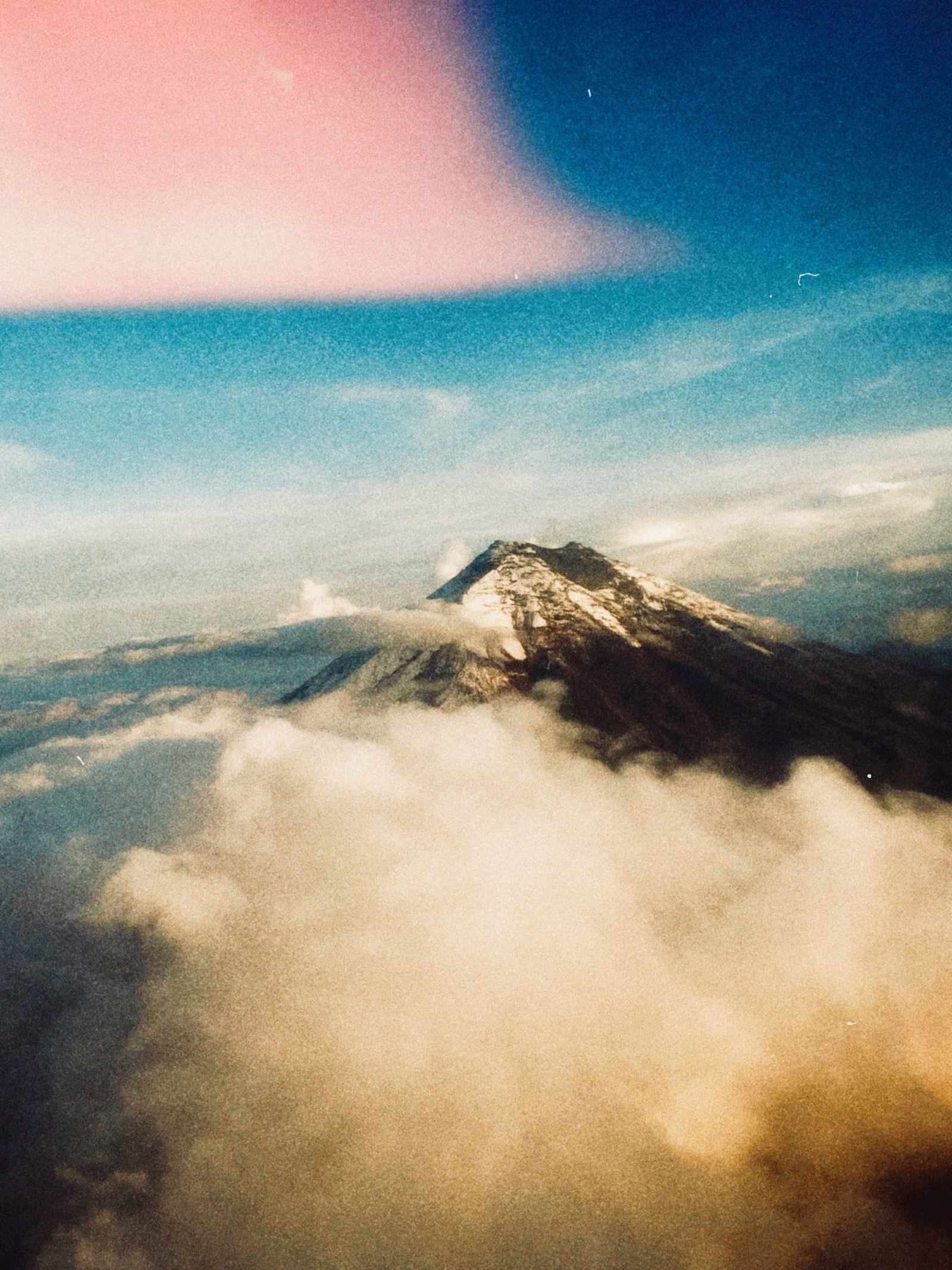 Volcano above the clouds